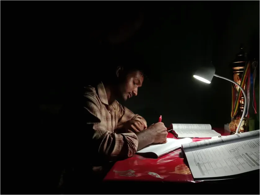 Detail Teen Doing Homework Late Night Desk Number 5