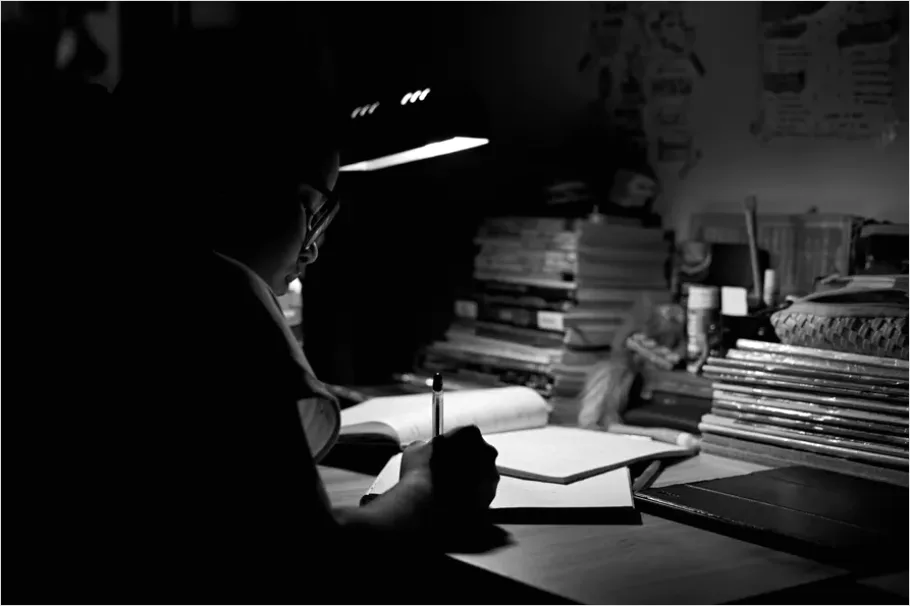 Detail Teen Doing Homework Late Night Desk Number 6