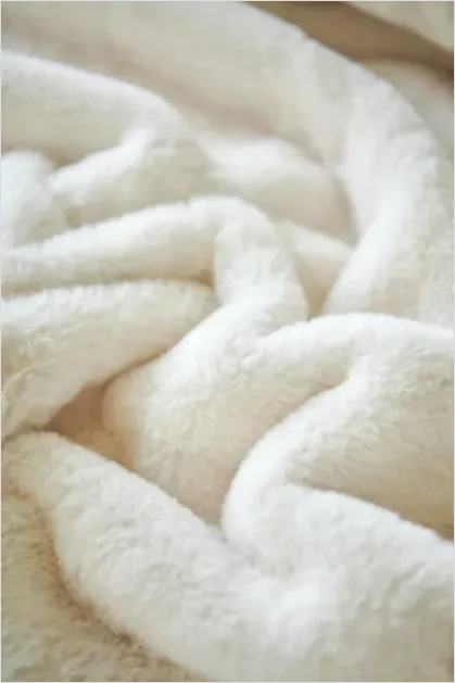 Detail Throw Blanket Folded On Sofa Number 8