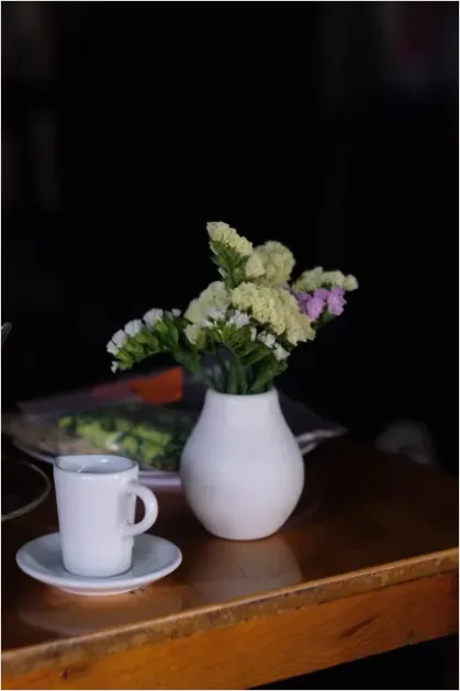 Detail Vase With Flowers On Table Number 3