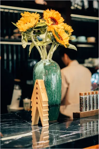 Detail Vase With Flowers On Table Number 4