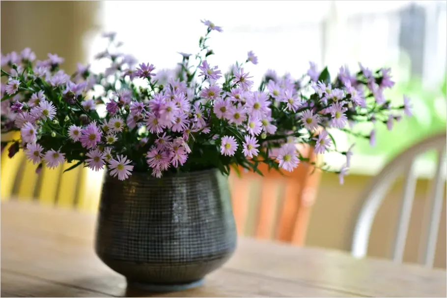 Detail Vase With Flowers On Table Number 9