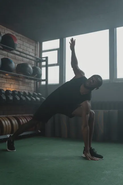 Detail Athlete Stretching Gym Moody Lighting Number 12