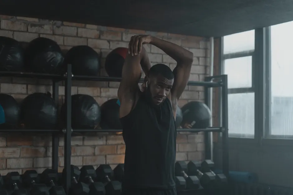 Detail Athlete Stretching Gym Moody Lighting Number 3