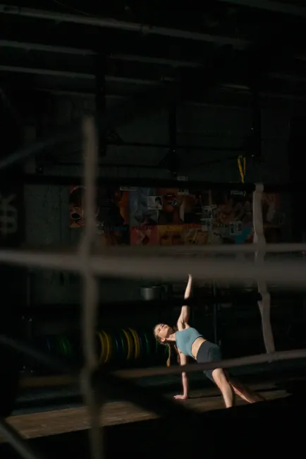 Detail Athlete Stretching Gym Moody Lighting Number 9