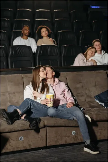 Detail Couple Watching Movie On Couch Number 7