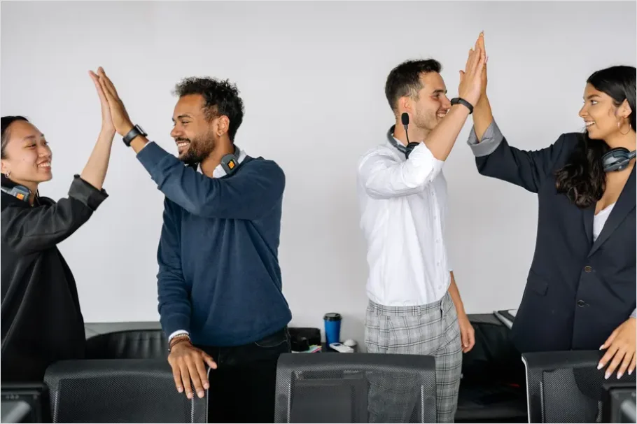 Detail Coworkers High Five Success Moment Number 11