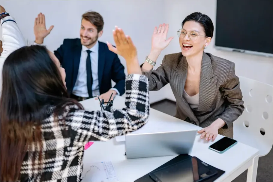 Detail Coworkers High Five Success Moment Number 12