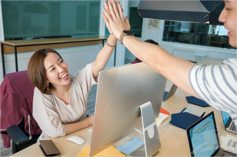 Detail Coworkers High Five Success Moment Number 14