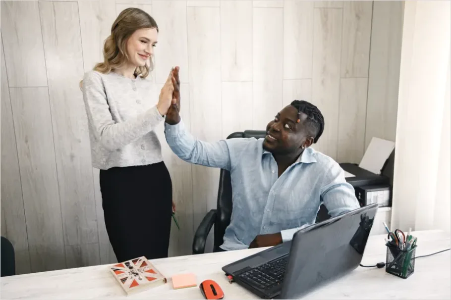 Detail Coworkers High Five Success Moment Number 4
