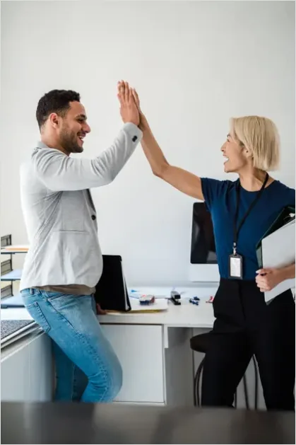 Detail Coworkers High Five Success Moment Number 5