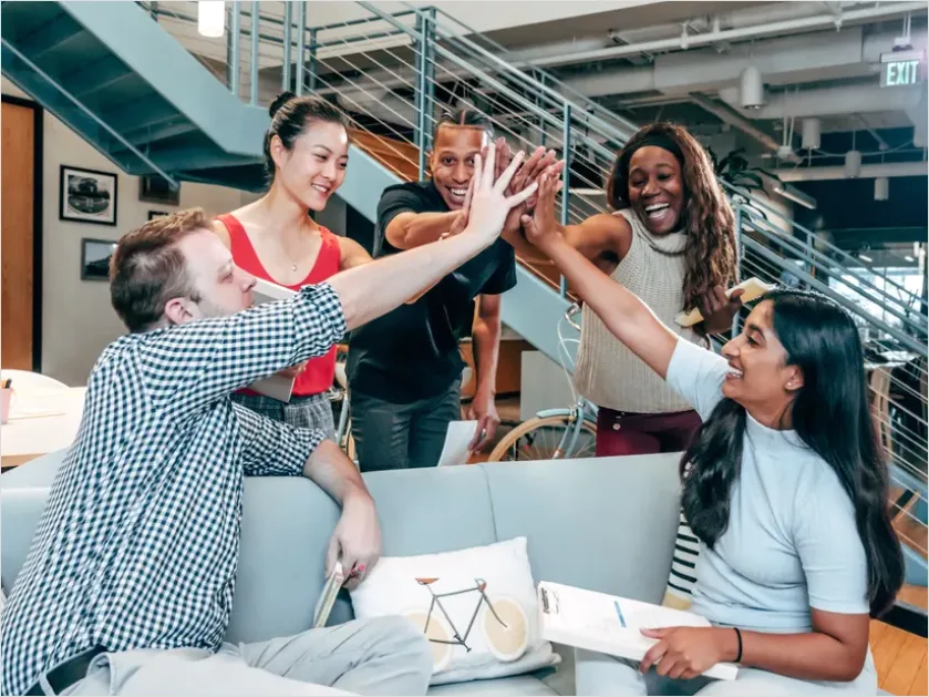 Detail Coworkers High Five Success Moment Number 7