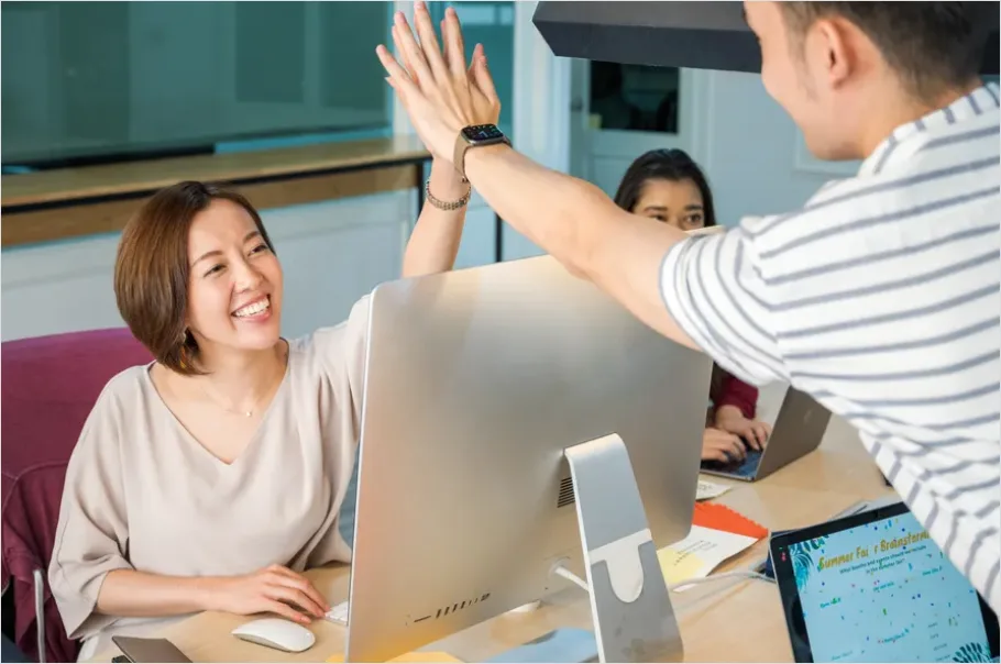 Detail Coworkers High Five Success Moment Number 8