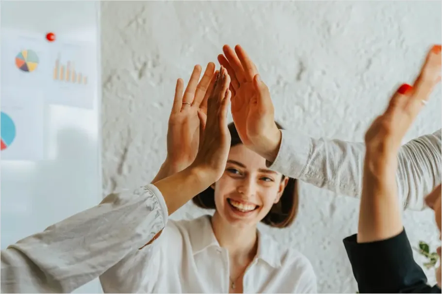 Detail Coworkers High Five Success Moment Number 9