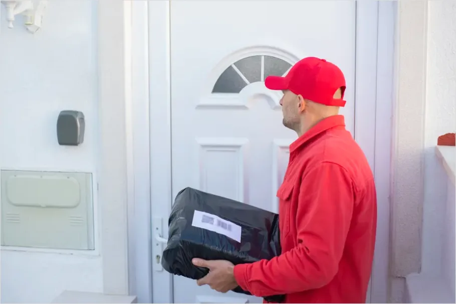 Detail Delivery Driver Holding Package Door Number 3