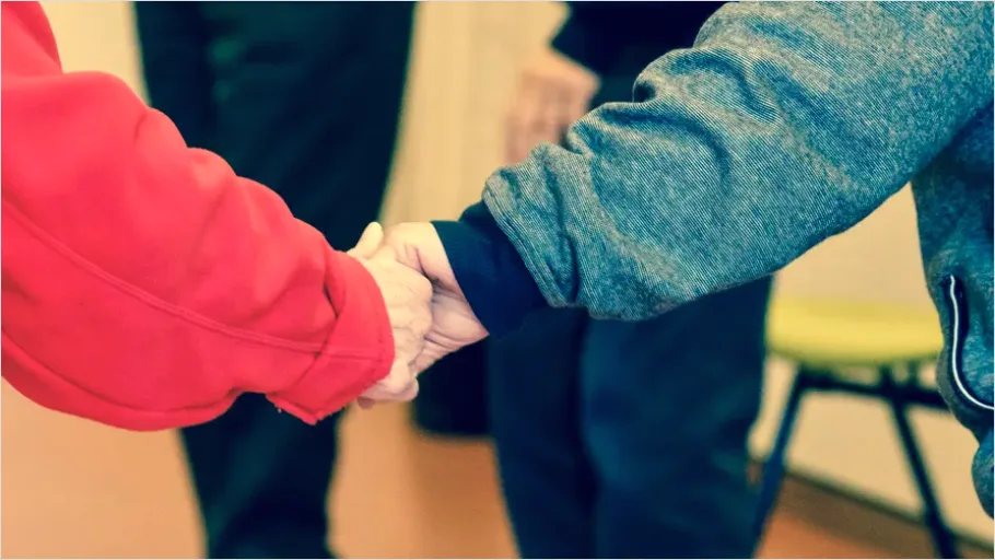Detail Elderly Care Caregiver Holding Hands Number 2