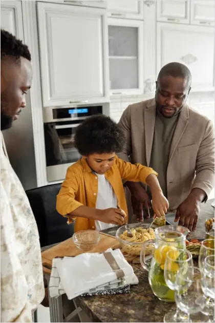 Family Cooking Dinner Together At Home 4096