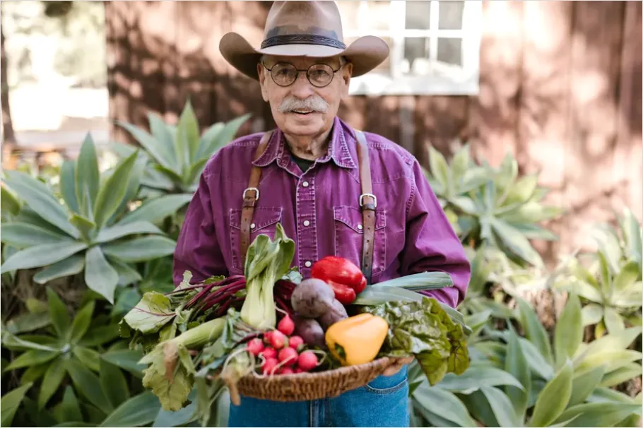 Farmer Holding Fresh Produce Portrait 8544