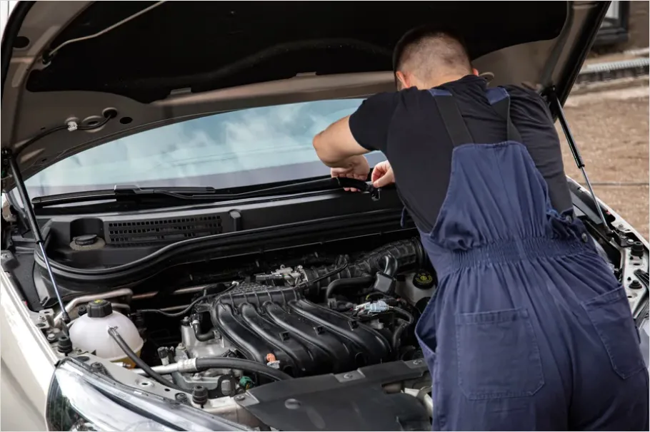 Detail Mechanic Working On Car Engine Number 13
