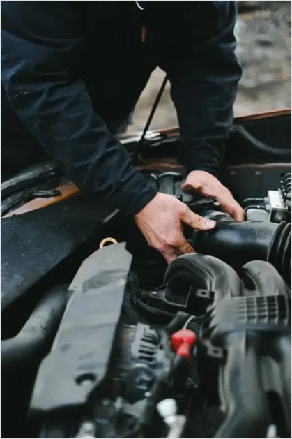 Detail Mechanic Working On Car Engine Number 14