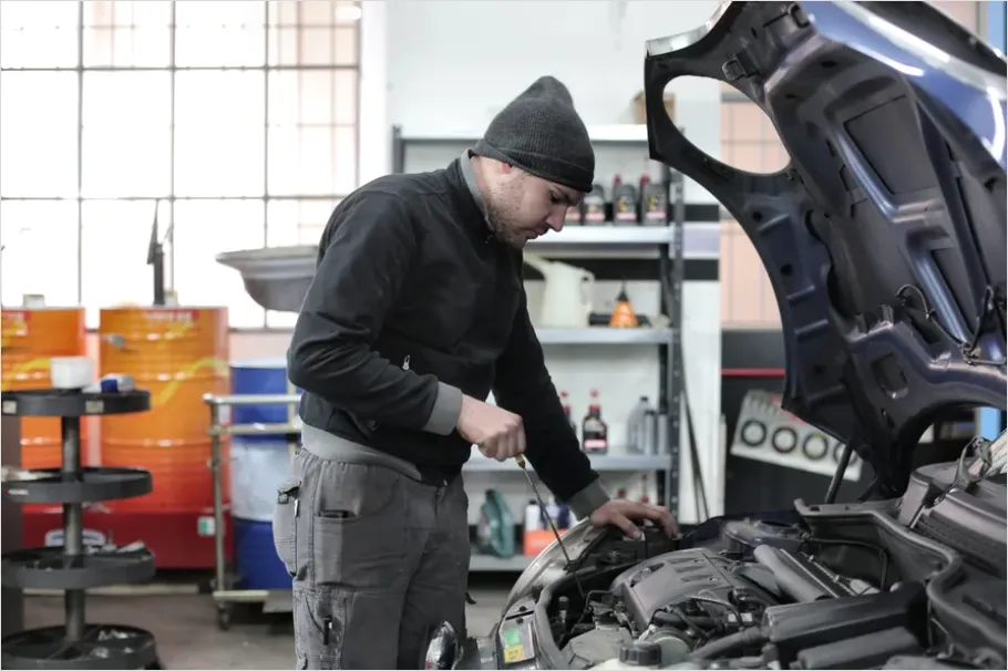 Detail Mechanic Working On Car Engine Number 4