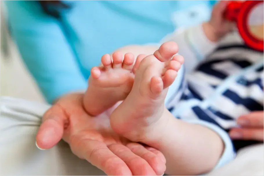 Detail Mother Hands Holding Baby Feet Number 15