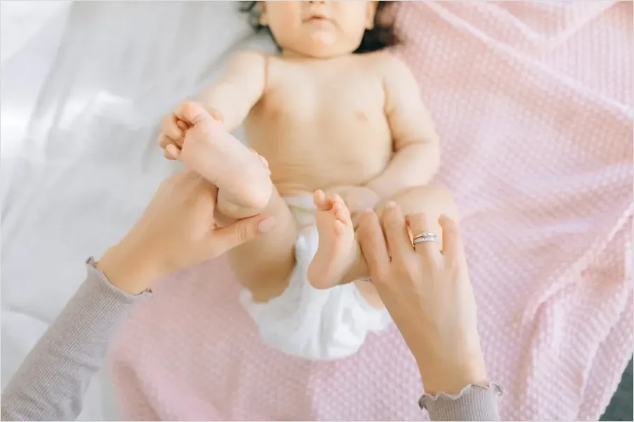 Detail Mother Hands Holding Baby Feet Number 16