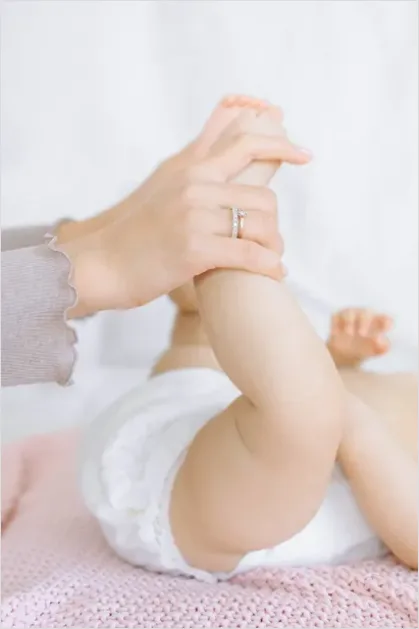 Detail Mother Hands Holding Baby Feet Number 7