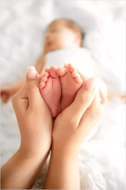 Detail Mother Hands Holding Baby Feet Number 9