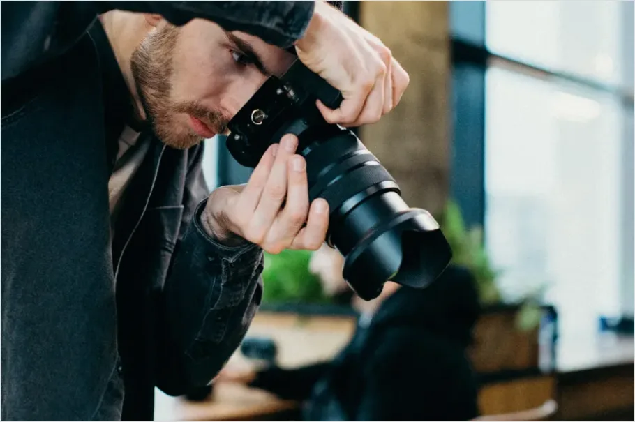 Detail Photographer Holding Camera Portrait Number 11