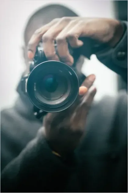 Detail Photographer Holding Camera Portrait Number 12