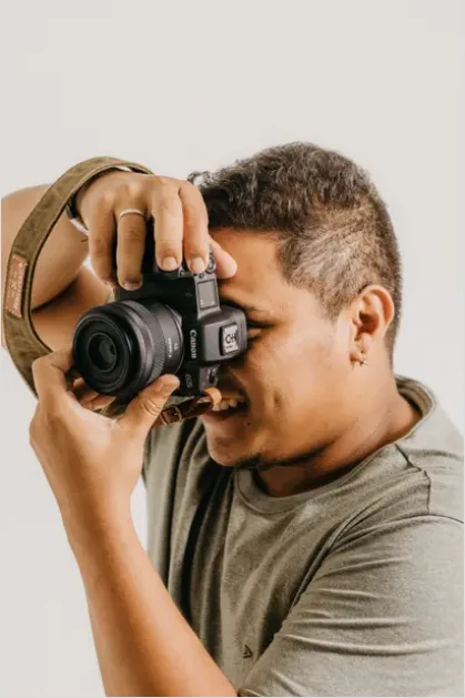 Detail Photographer Holding Camera Portrait Number 13