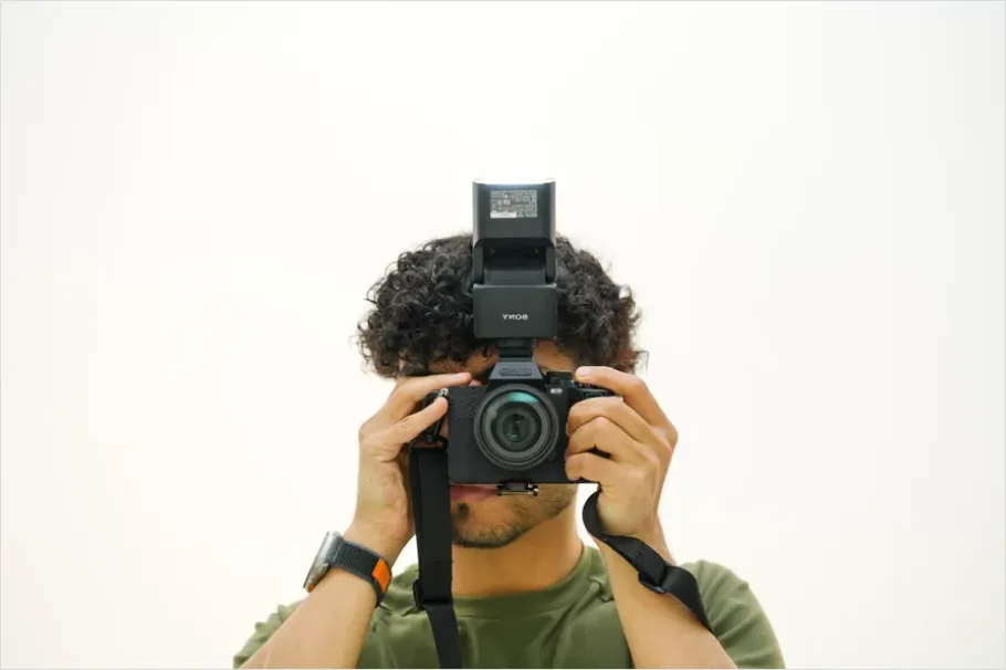 Detail Photographer Holding Camera Portrait Number 14