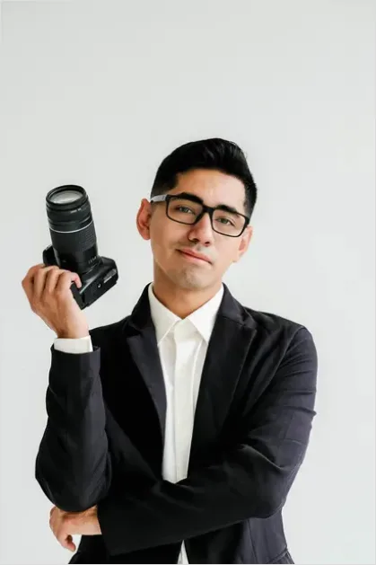 Detail Photographer Holding Camera Portrait Number 15