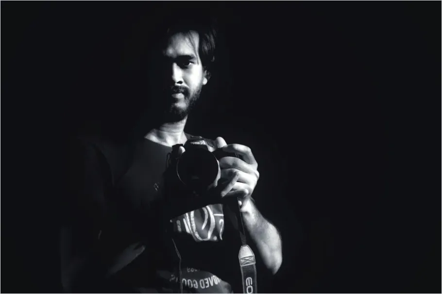Detail Photographer Holding Camera Portrait Number 16
