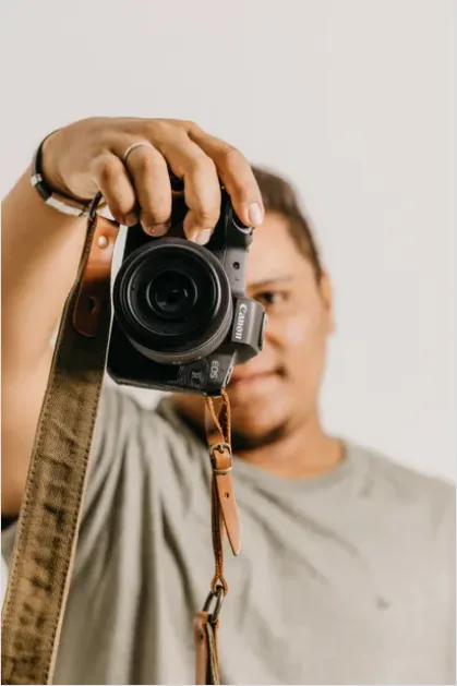 Detail Photographer Holding Camera Portrait Number 6