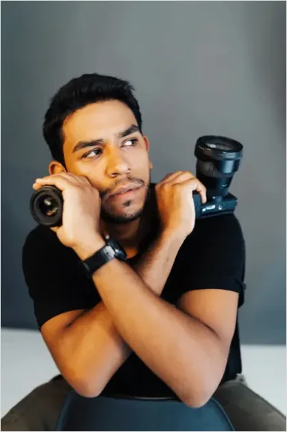 Detail Photographer Holding Camera Portrait Number 8