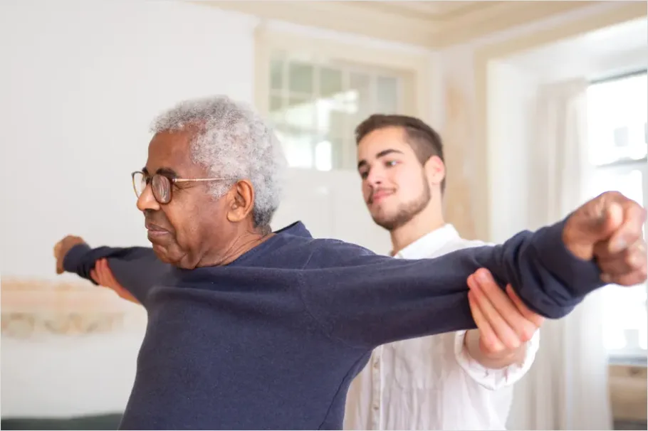 Detail Physical Therapist Helping Patient Stretch Number 2