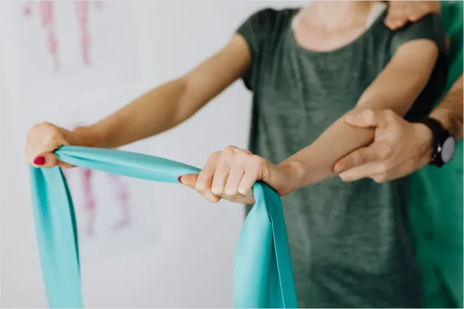 Detail Physical Therapist Helping Patient Stretch Number 5