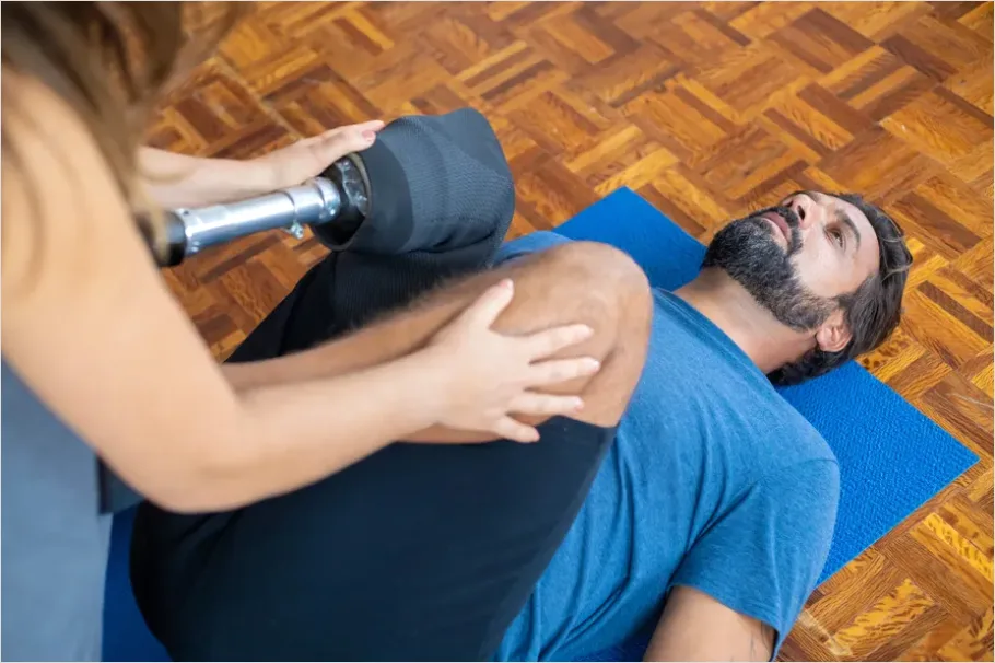 Detail Physical Therapist Helping Patient Stretch Number 8