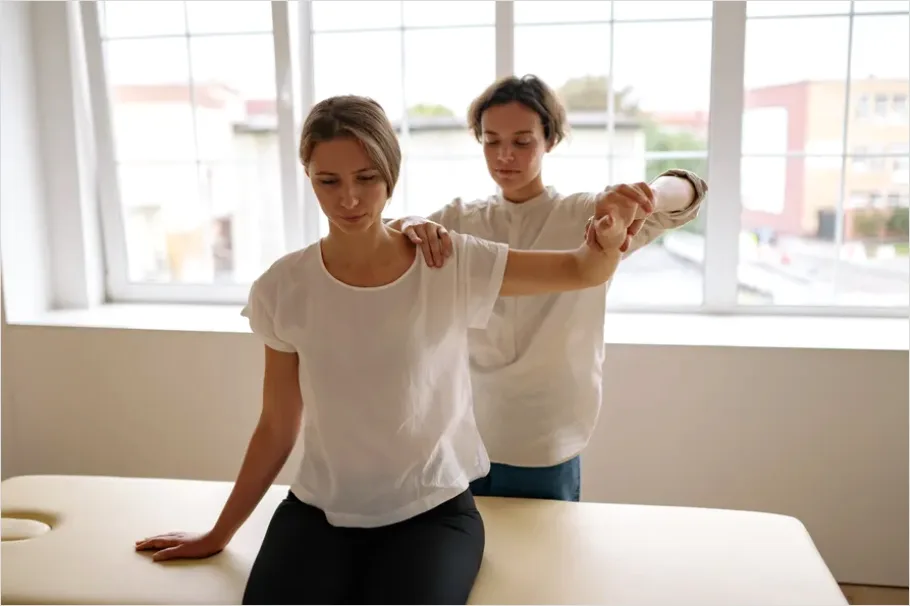 Detail Physical Therapist Helping Patient Stretch Number 10