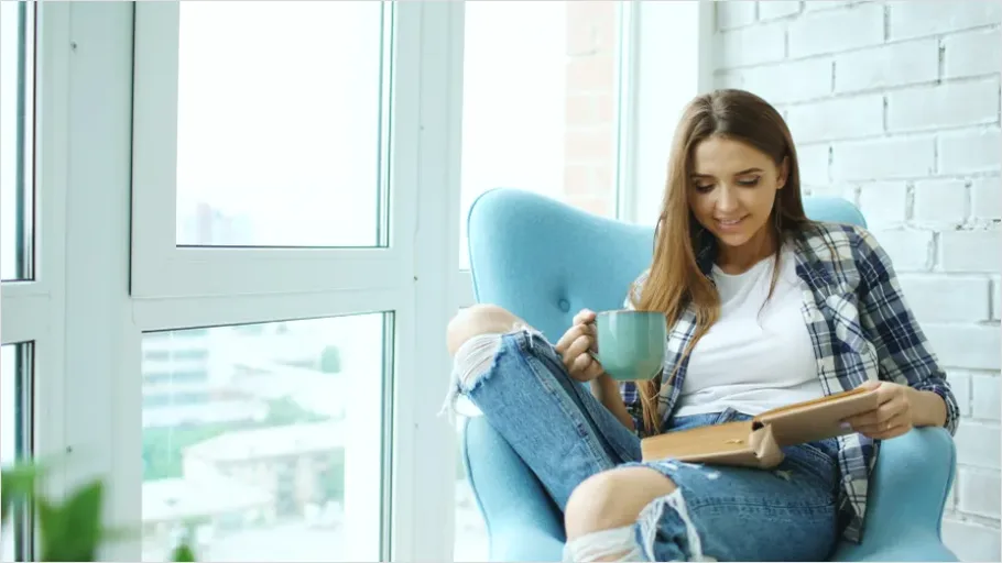 Detail Woman Reading Book Cozy Chair Number 13