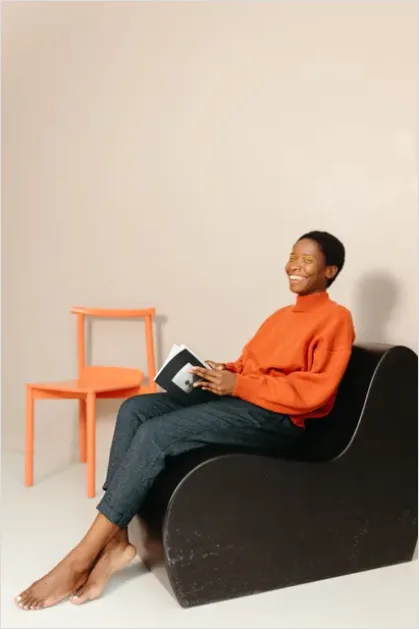 Detail Woman Reading Book Cozy Chair Number 10