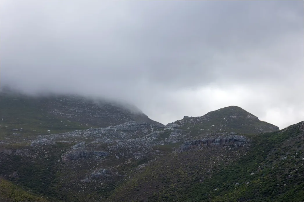 Detail Low Clouds Hugging Mountain Slopes Number 2
