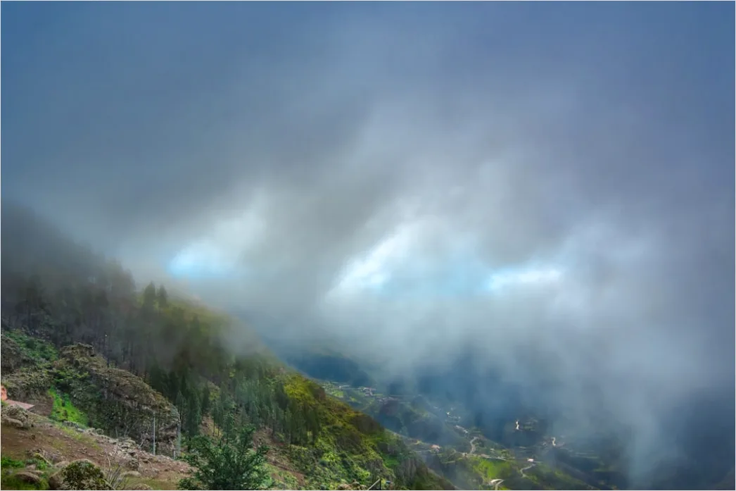 Detail Low Clouds Hugging Mountain Slopes Number 19