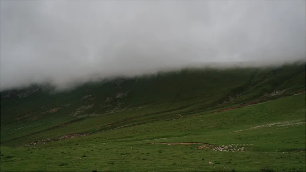 Detail Low Clouds Hugging Mountain Slopes Number 4
