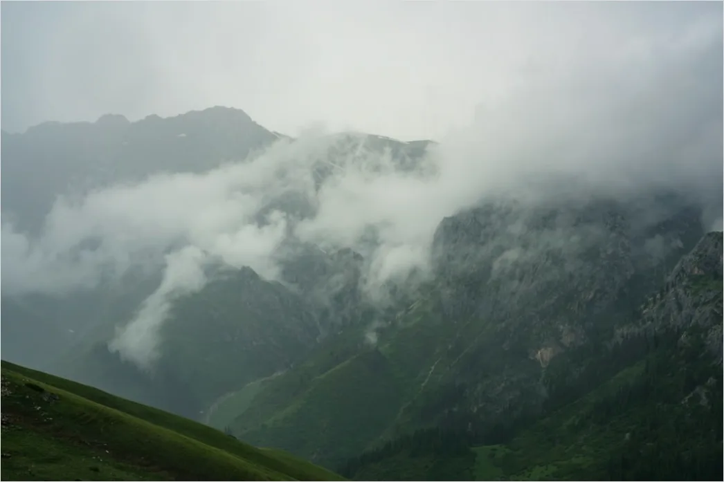 Detail Low Clouds Hugging Mountain Slopes Number 6