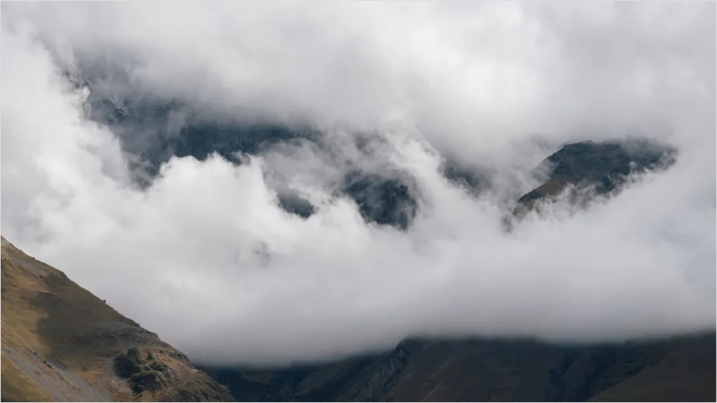 Detail Low Clouds Hugging Mountain Slopes Number 9
